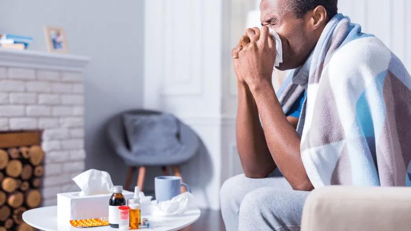 Man experiencing the flu.