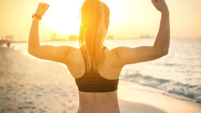 Image of a woman flexing her arms