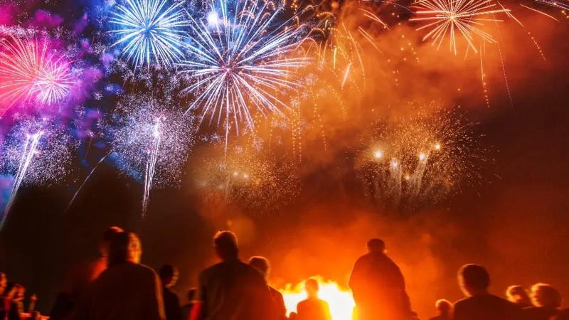 Group of people watching fireworks