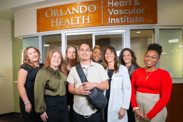 Man standing in front of his doctors