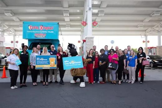 Group of people holding signs