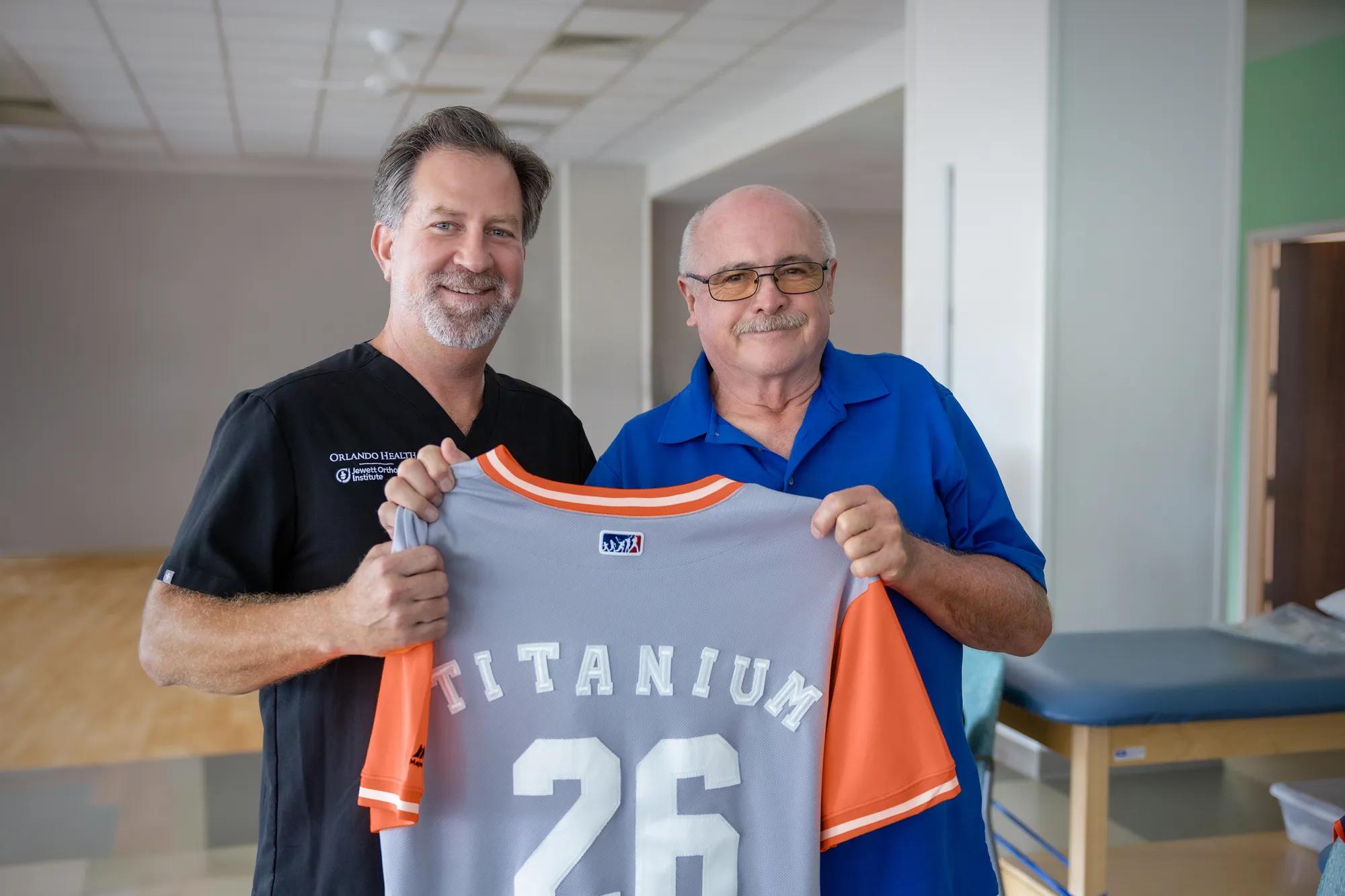 Sal holding jersey